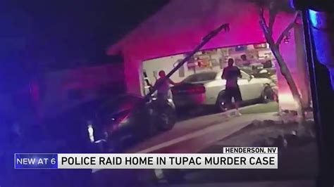 Police videos show SWAT officers detaining man, woman during home raid in Tupac Shakur cold case